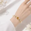 Vòng Tay Ngọc Hoà Điền Bơ Vàng (Phối Hoa Sen) - Ảnh 3